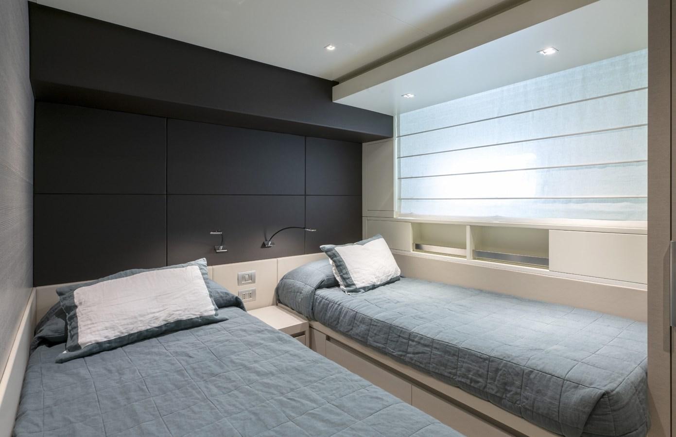 a room with two beds aboard 2017 SANLORENZO SL86 # 676 Yacht for Sale