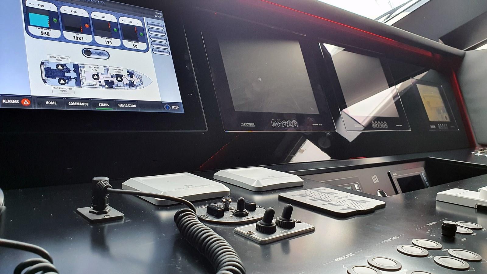 a computer with a keyboard and monitor aboard WHITE SHARK Yacht for Sale