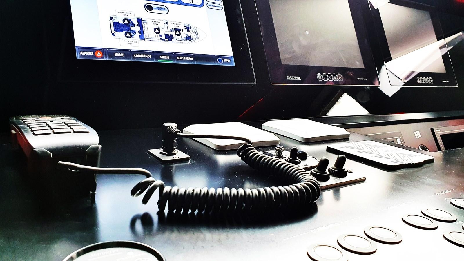 a black video game controller aboard WHITE SHARK Yacht for Sale