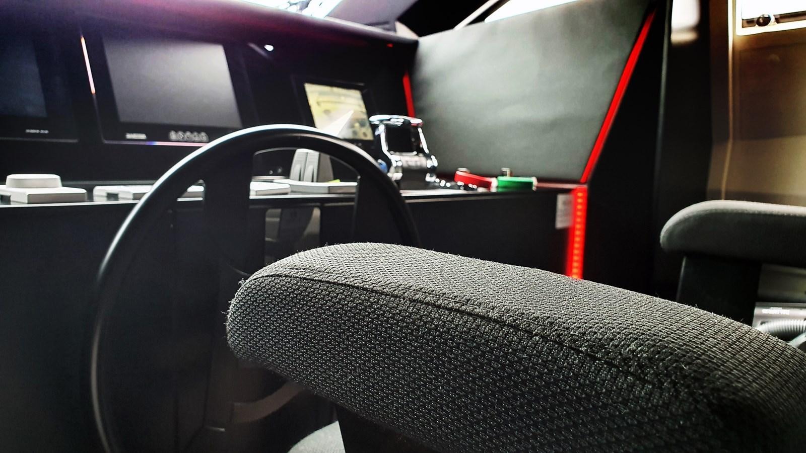 a car with a seat belt aboard WHITE SHARK Yacht for Sale