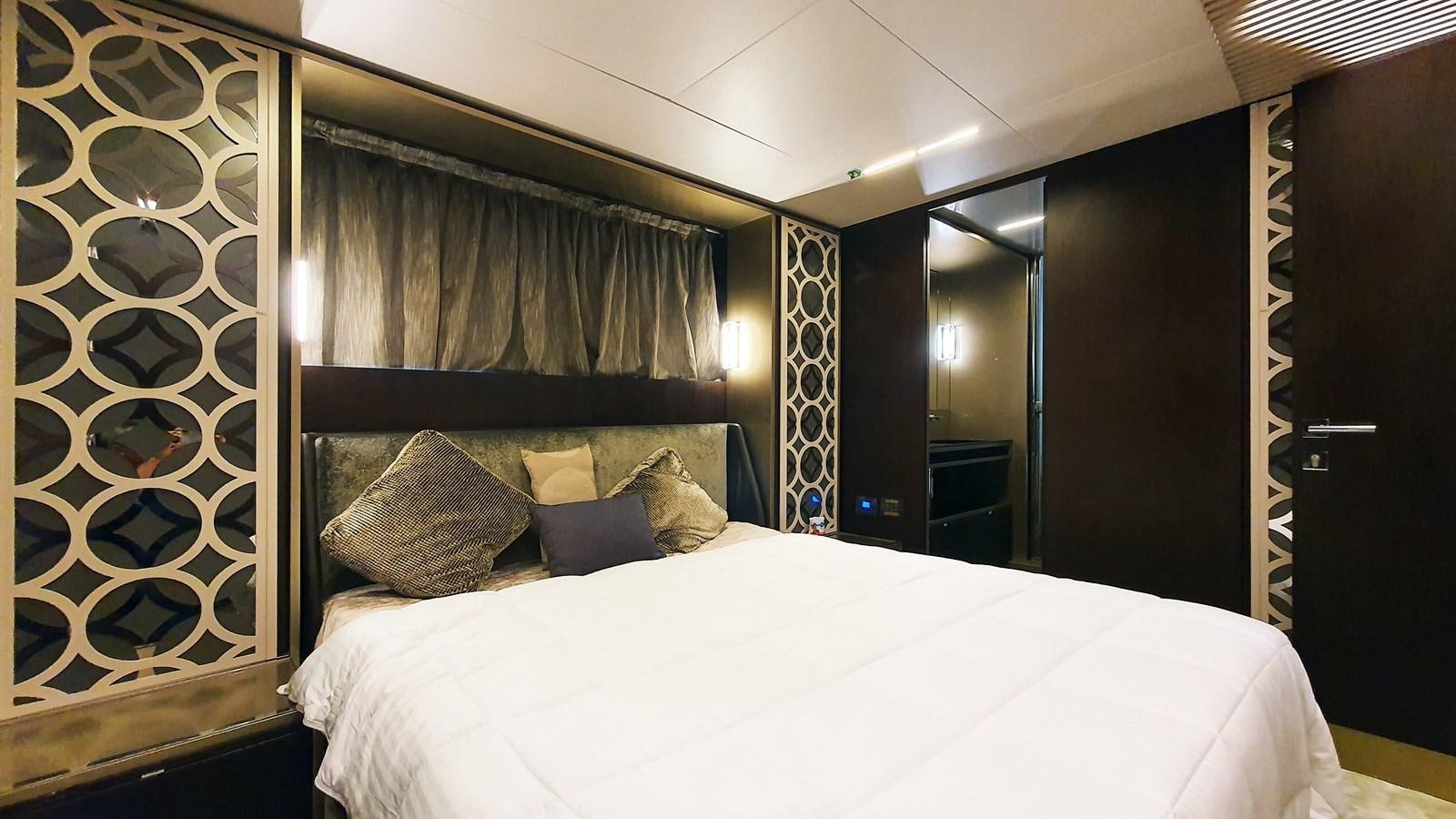 a bed with pillows aboard WHITE SHARK Yacht for Sale