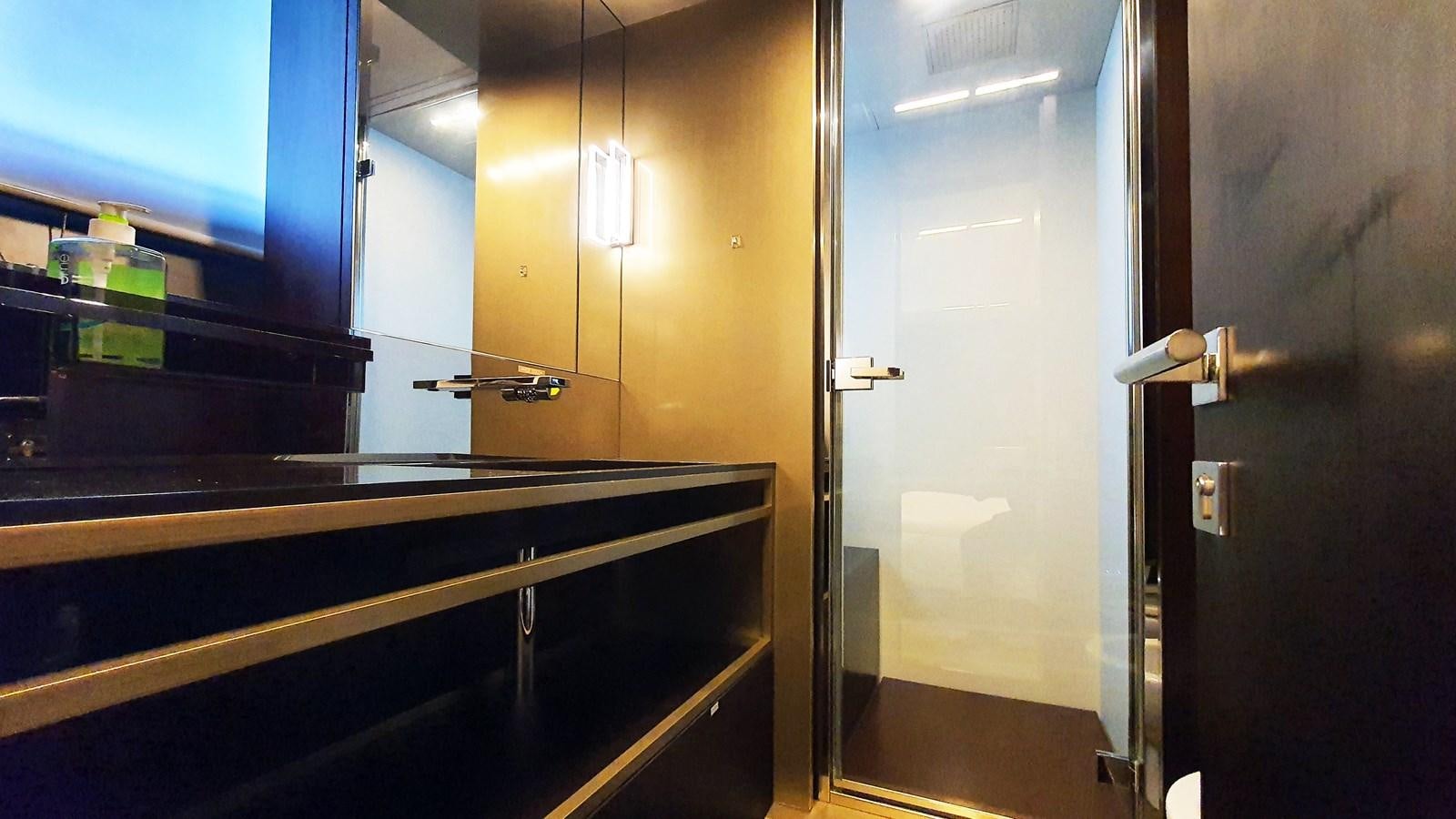 a room with a counter and a door aboard WHITE SHARK Yacht for Sale