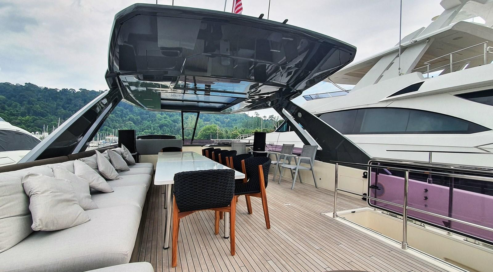 a deck with a large yacht aboard WHITE SHARK Yacht for Sale