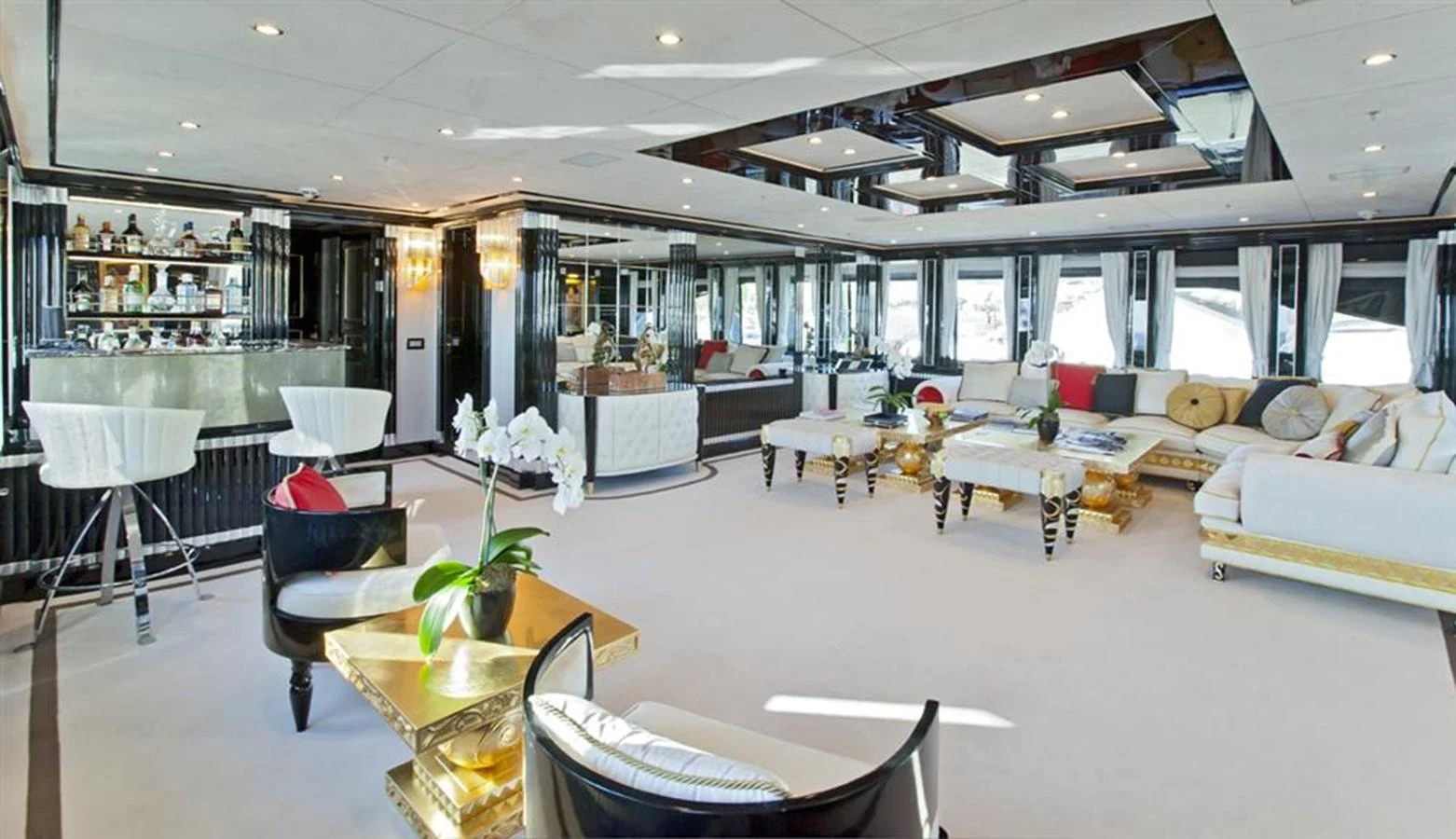 a room with a couch and chairs aboard ALEXANDER AGAIN Yacht for Sale