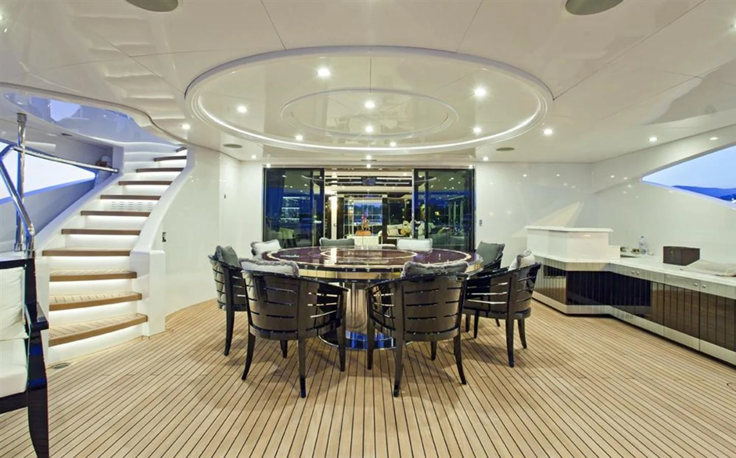 a large room with a table and chairs aboard ALEXANDER AGAIN Yacht for Sale