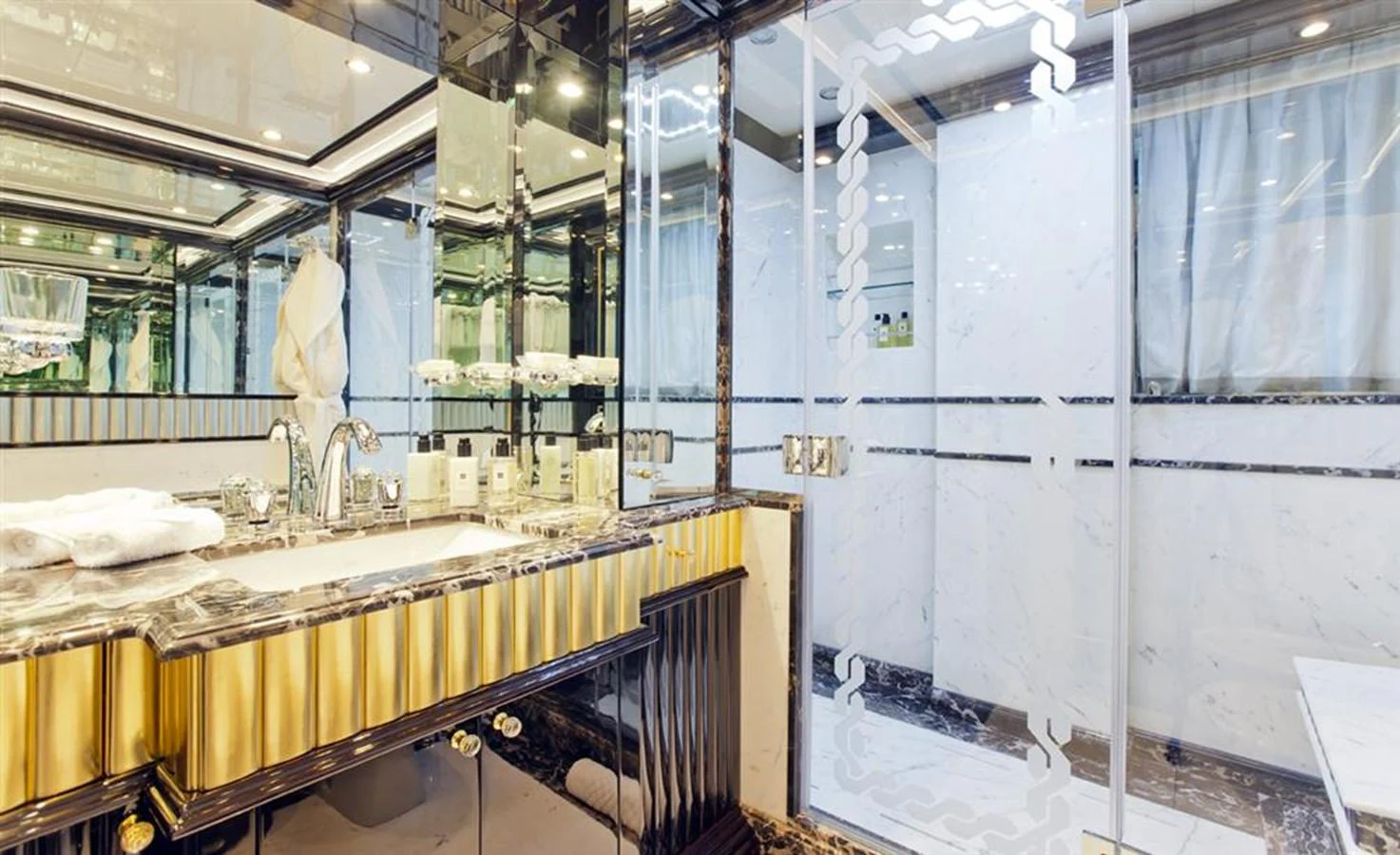 a bathroom with a countertop sink and mirror aboard ALEXANDER AGAIN Yacht for Sale
