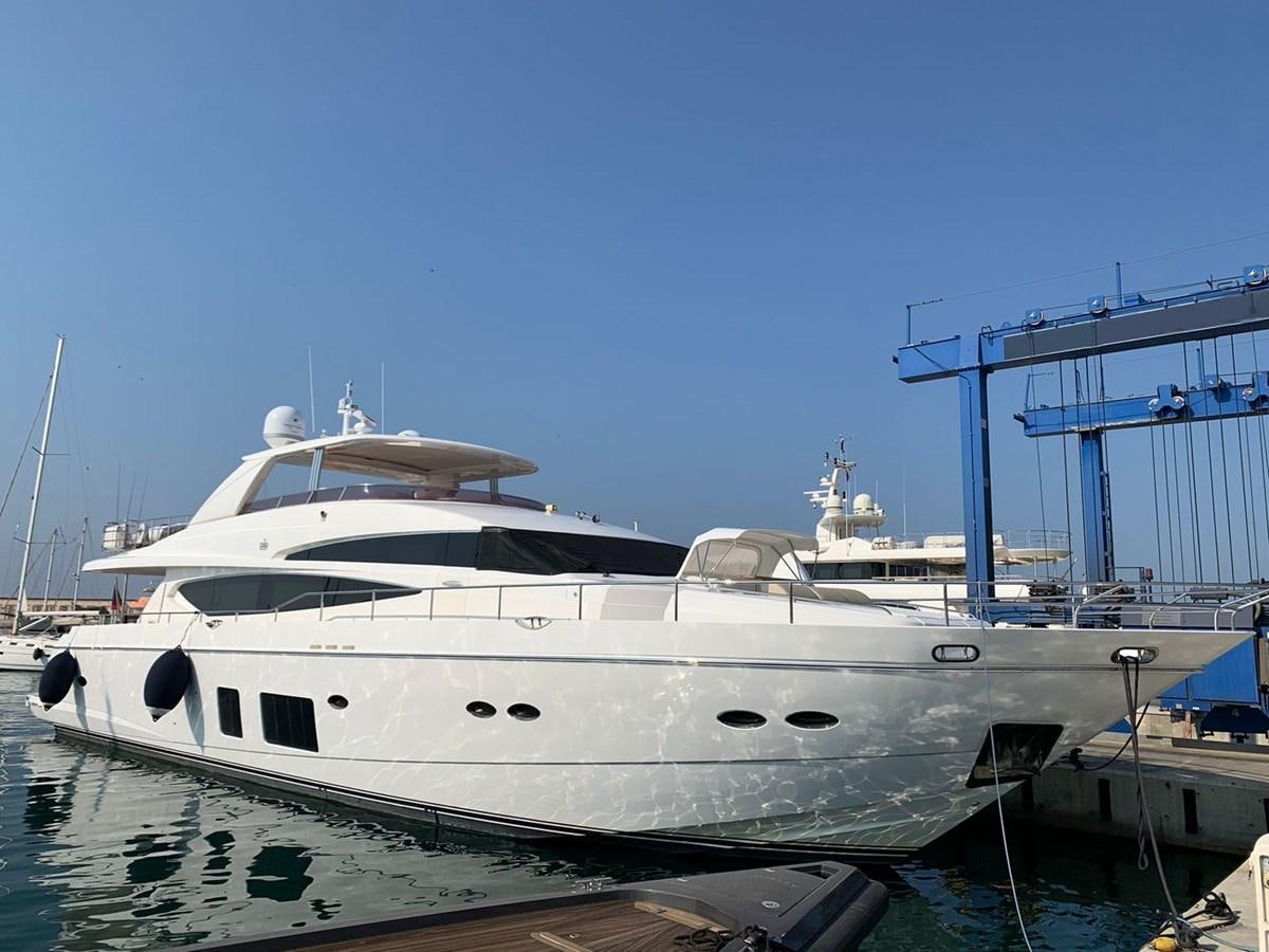 a white yacht docked aboard SEA ARK Yacht for Sale