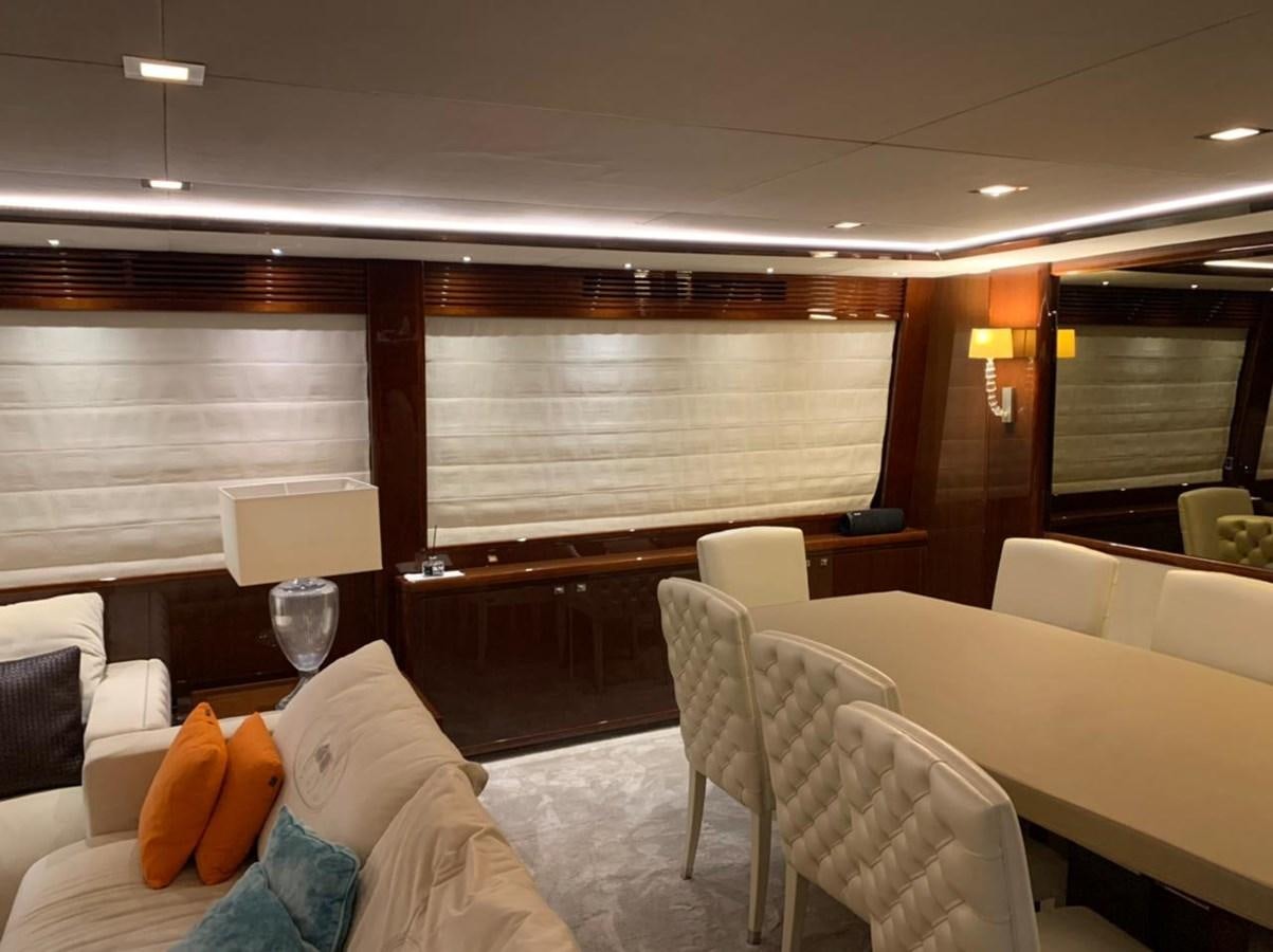 a room with couches and a table aboard SEA ARK Yacht for Sale