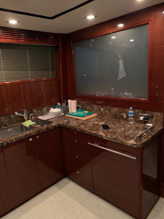 a bathroom with a large mirror aboard SEA ARK Yacht for Sale
