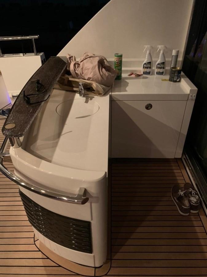 a white washing machine aboard SEA ARK Yacht for Sale