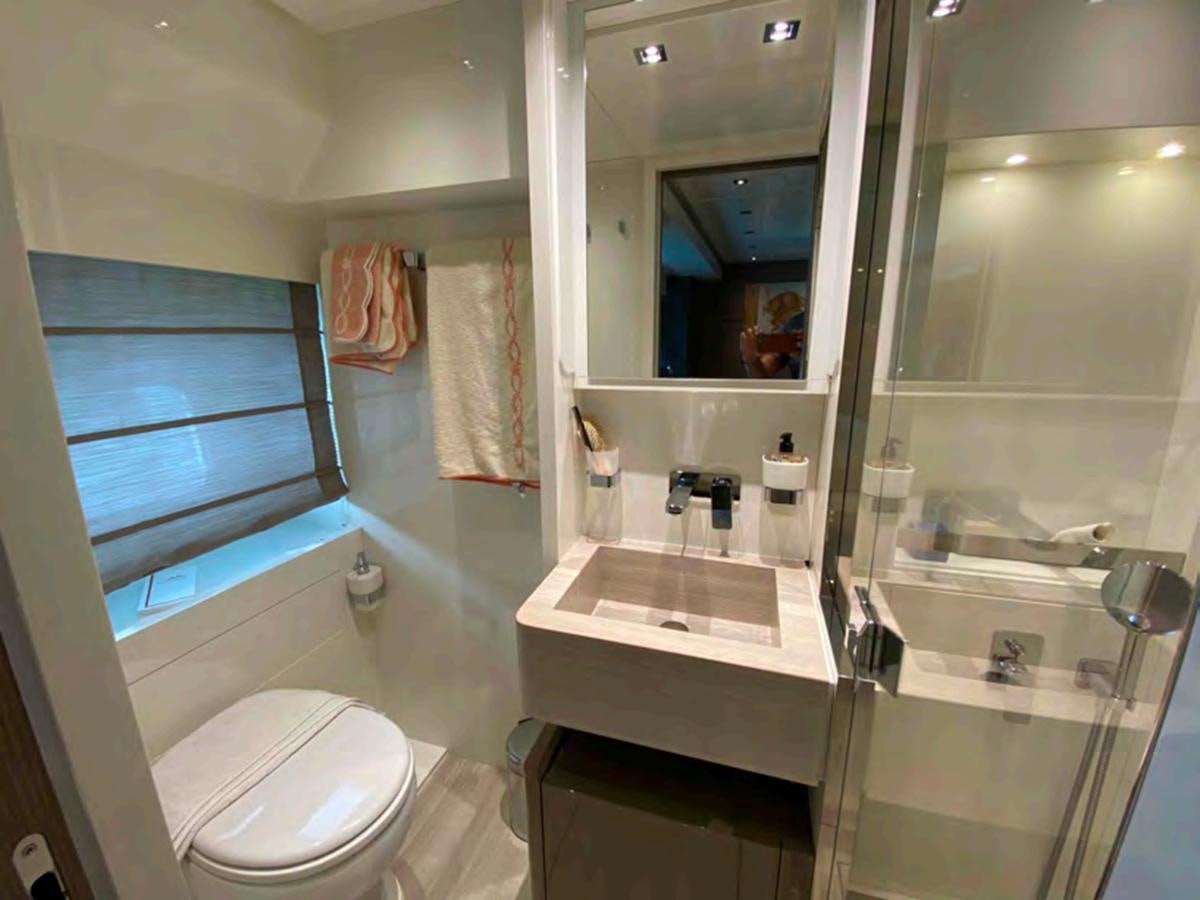 a bathroom with a sink and a toilet aboard MARITTA’S Yacht for Sale