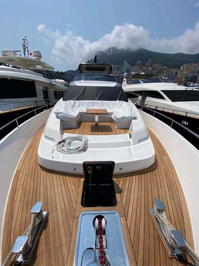 a boat on a deck aboard MARITTA’S Yacht for Sale