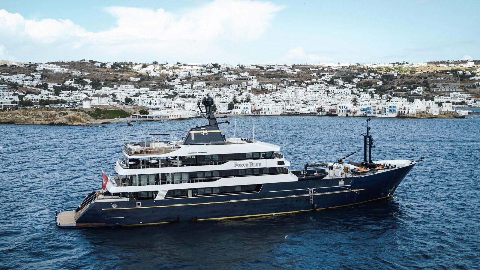 a large ship in the water aboard FORCE BLUE Yacht for Sale