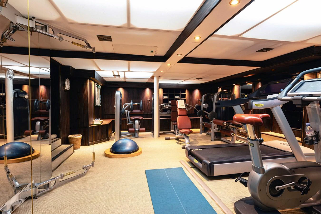 a gym with exercise equipment aboard FORCE BLUE Yacht for Sale