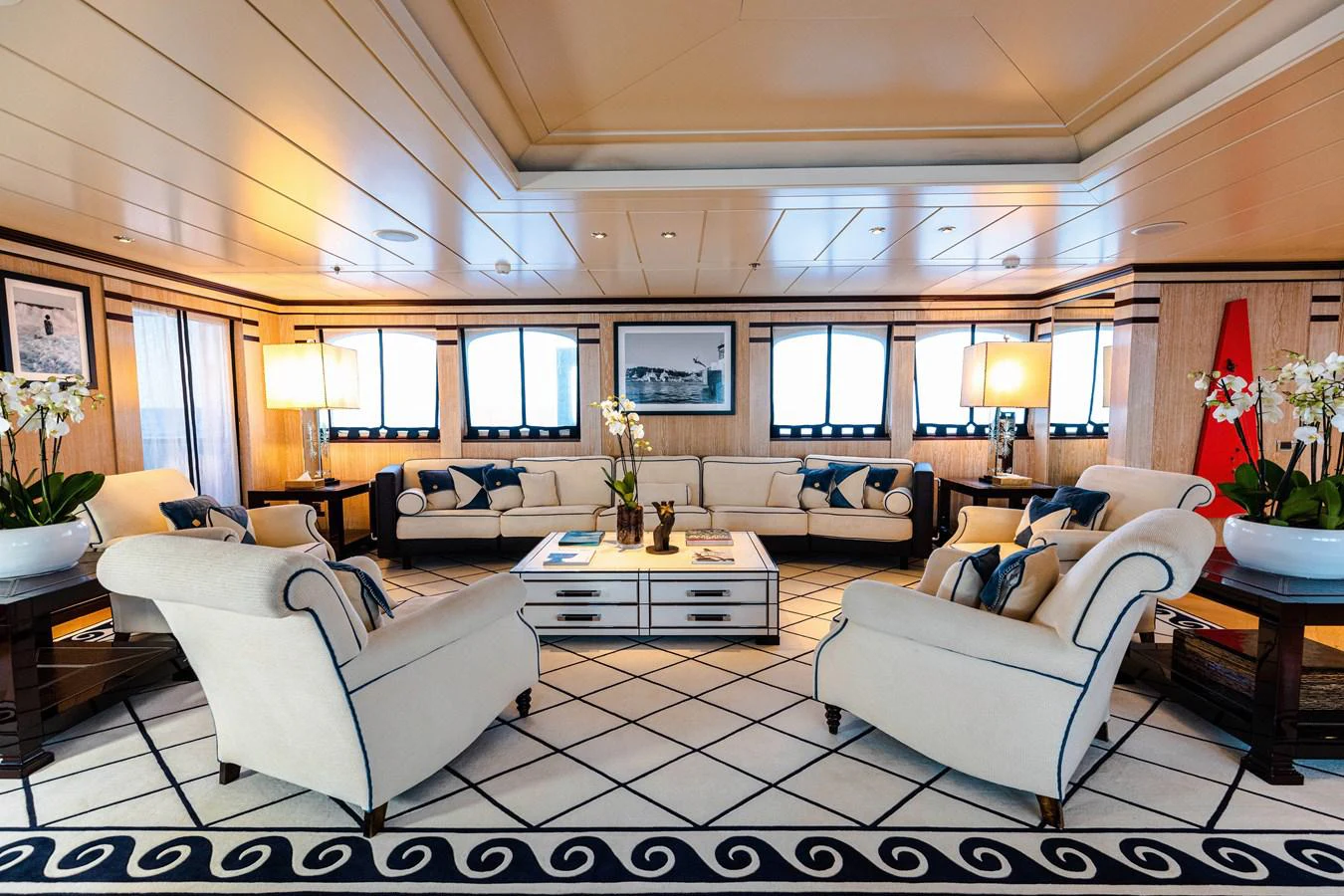 a living room with a white couch and a table aboard FORCE BLUE Yacht for Sale