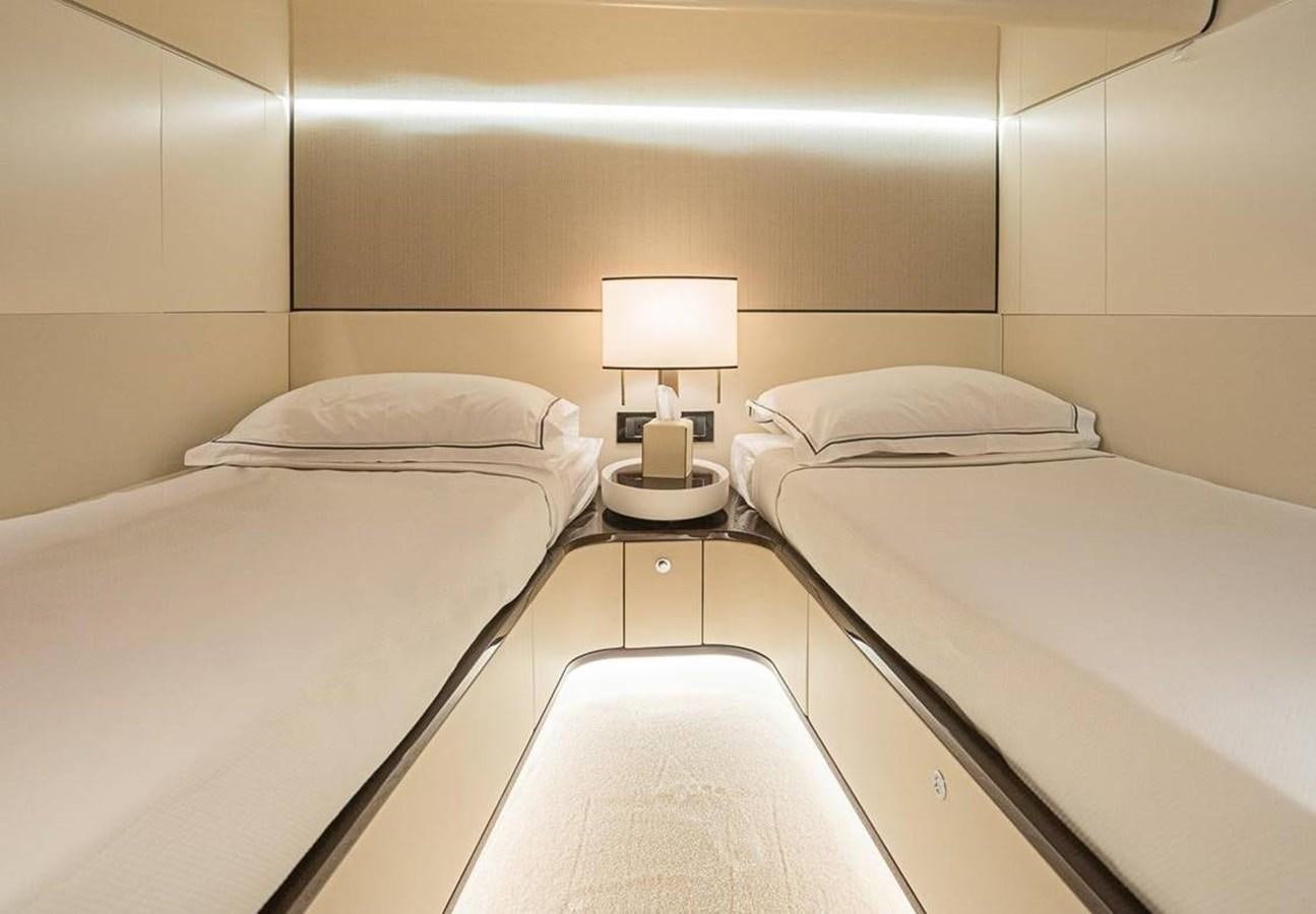 a couple of beds in a hotel room aboard LULWA Yacht for Sale
