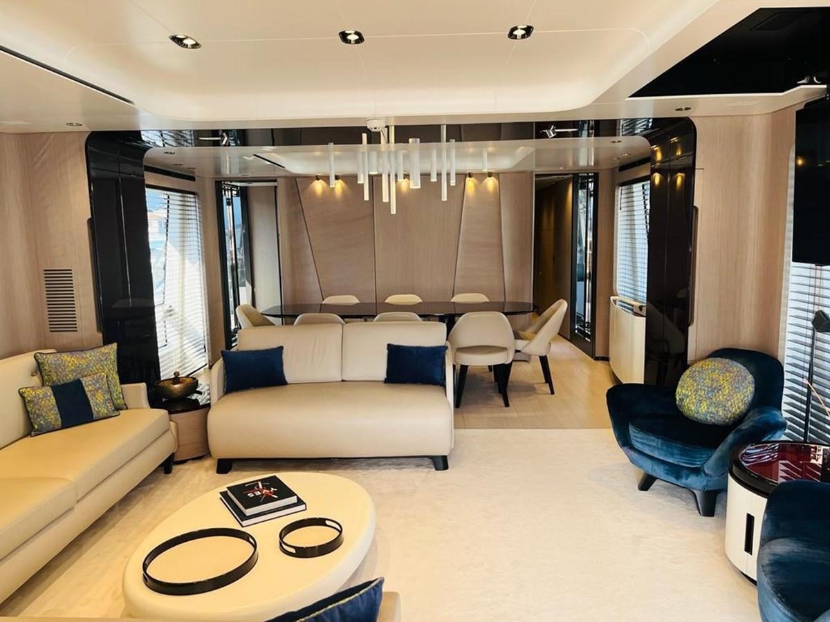 a living room with a couch and a table aboard LULWA Yacht for Sale