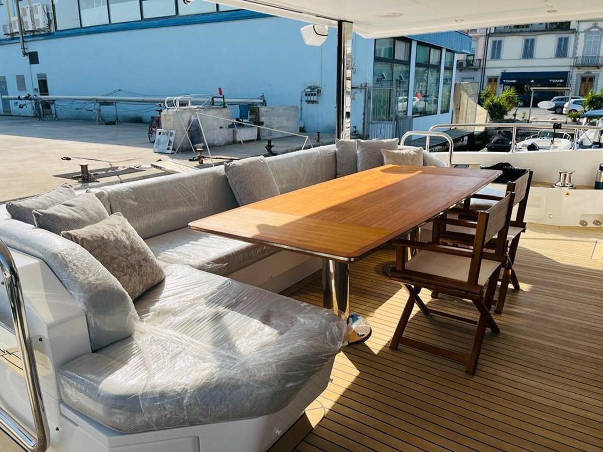 a living room with a couch and a table aboard LULWA Yacht for Sale