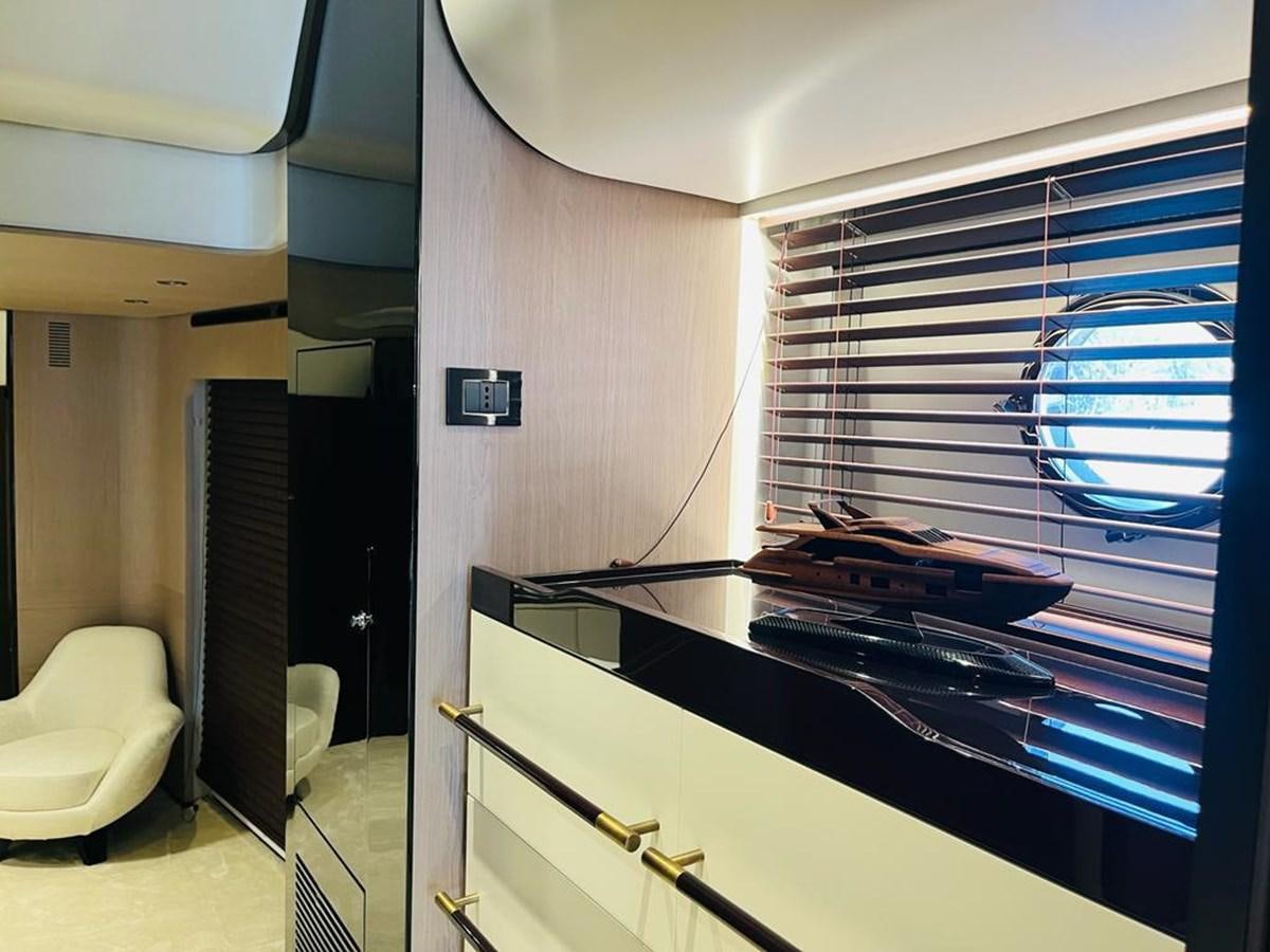 a room with a desk and a chair aboard LULWA Yacht for Sale
