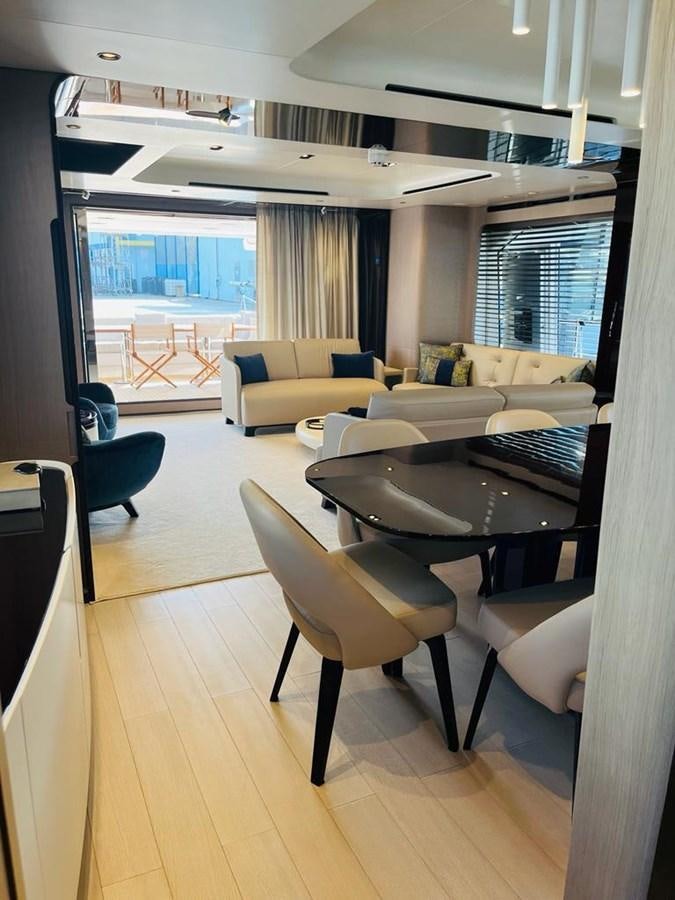 a living room with a large window aboard LULWA Yacht for Sale