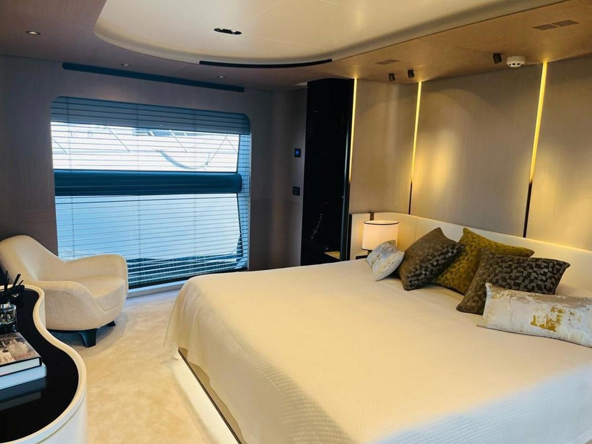 a bedroom with a large bed aboard LULWA Yacht for Sale