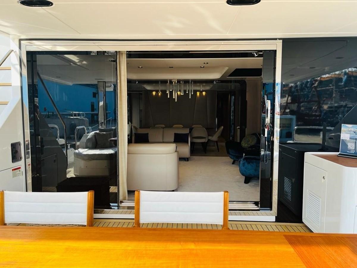 a room with a sliding glass door aboard LULWA Yacht for Sale