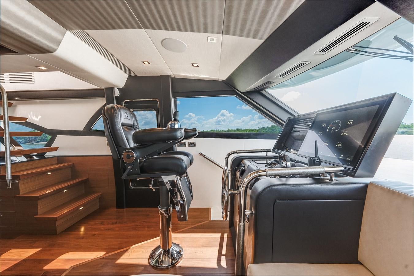 a car with luggage in it aboard 2018 OCEAN ALEXANDER 70E TIRESUM Yacht for Sale