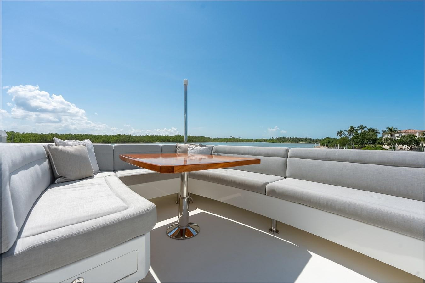 a table on a boat aboard 2018 OCEAN ALEXANDER 70E TIRESUM Yacht for Sale