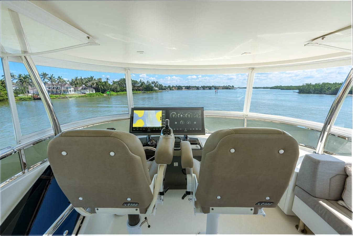 a boat with a screen and a monitor on the front aboard 2018 OCEAN ALEXANDER 70E TIRESUM Yacht for Sale
