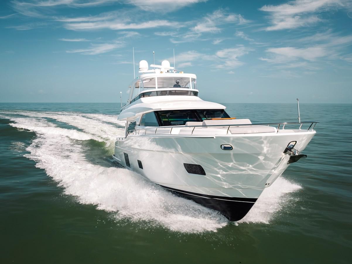 a white yacht on the water aboard 2018 OCEAN ALEXANDER 70E TIRESUM Yacht for Sale