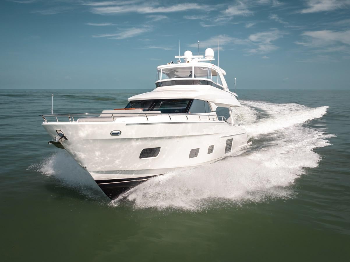 a white yacht on the water aboard 2018 OCEAN ALEXANDER 70E TIRESUM Yacht for Sale
