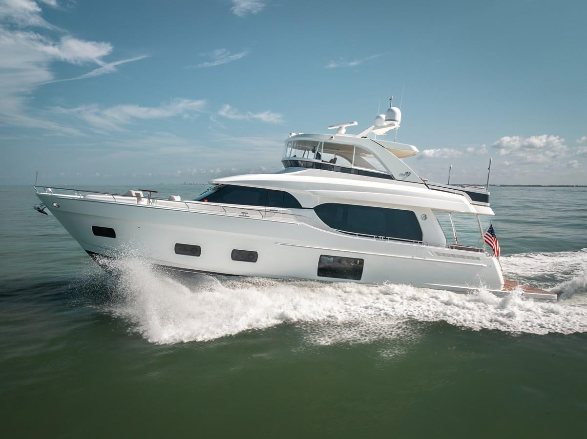 a white yacht on the water aboard 2018 OCEAN ALEXANDER 70E TIRESUM Yacht for Sale