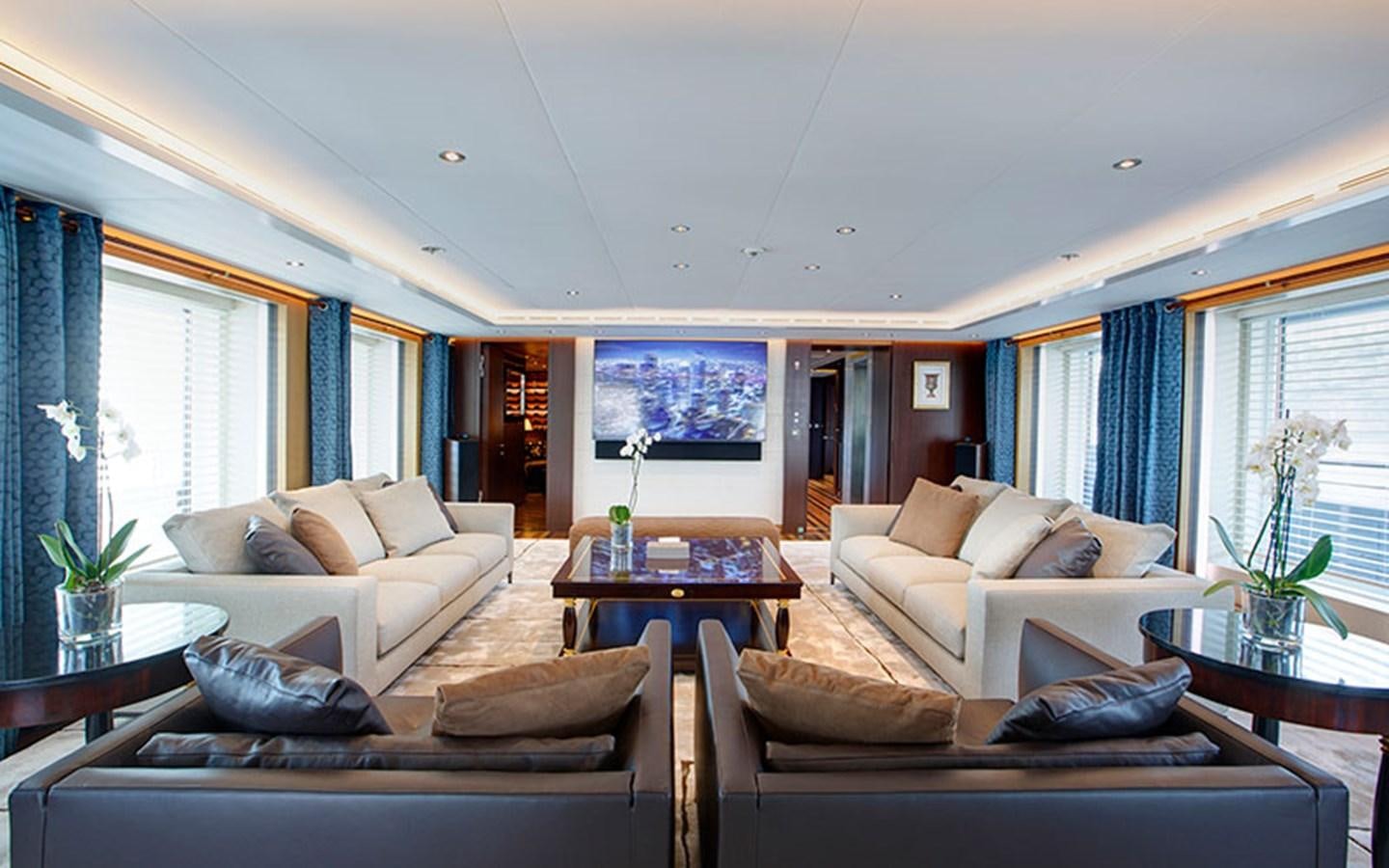 a living room with a large sofa aboard MARUN Yacht for Sale
