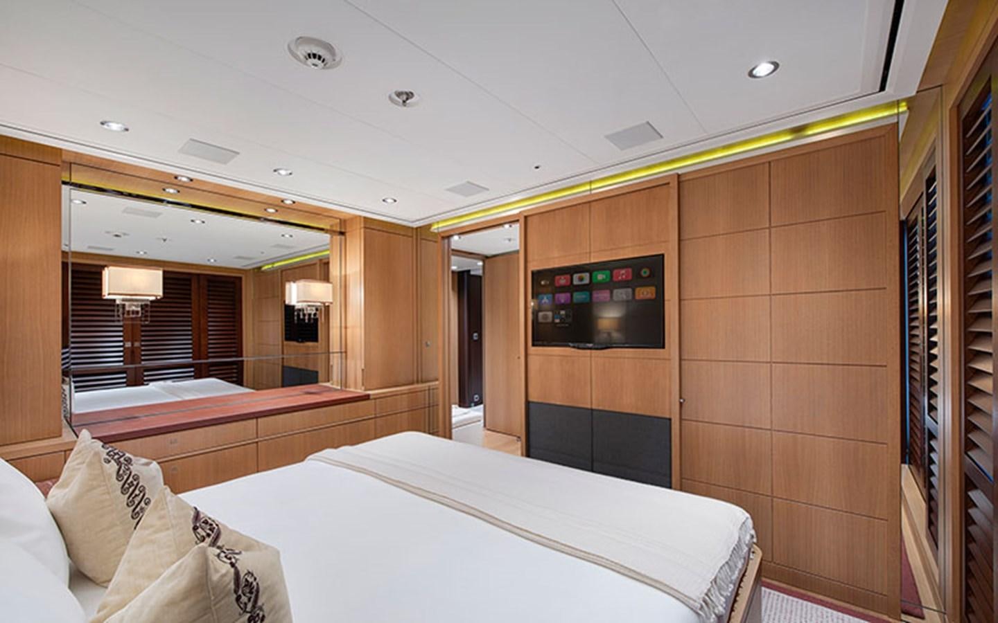 a room with a bed and a tv aboard MARUN Yacht for Sale