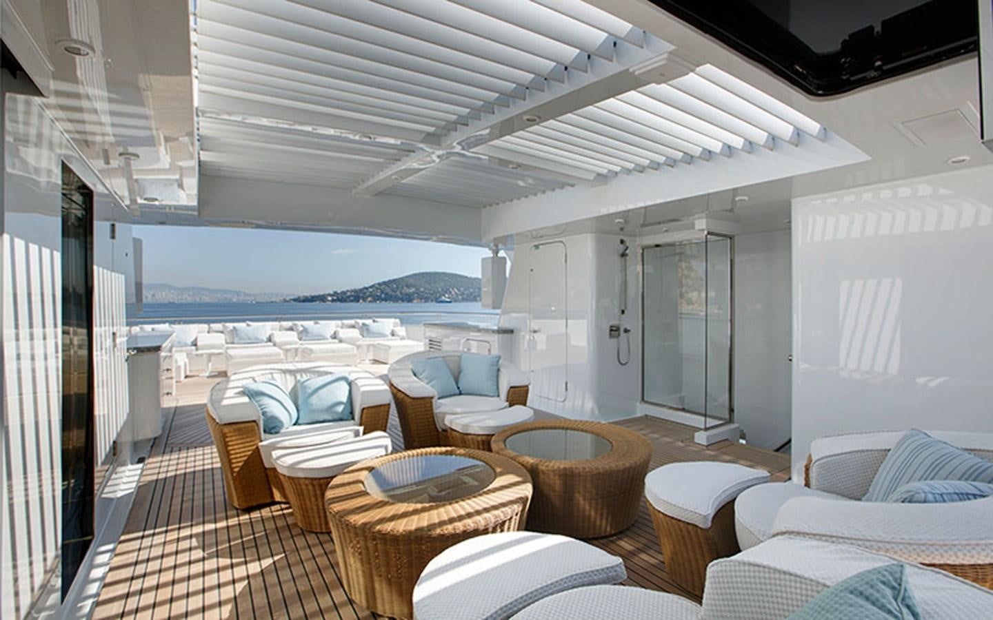 a large room with a large pool aboard MARUN Yacht for Sale