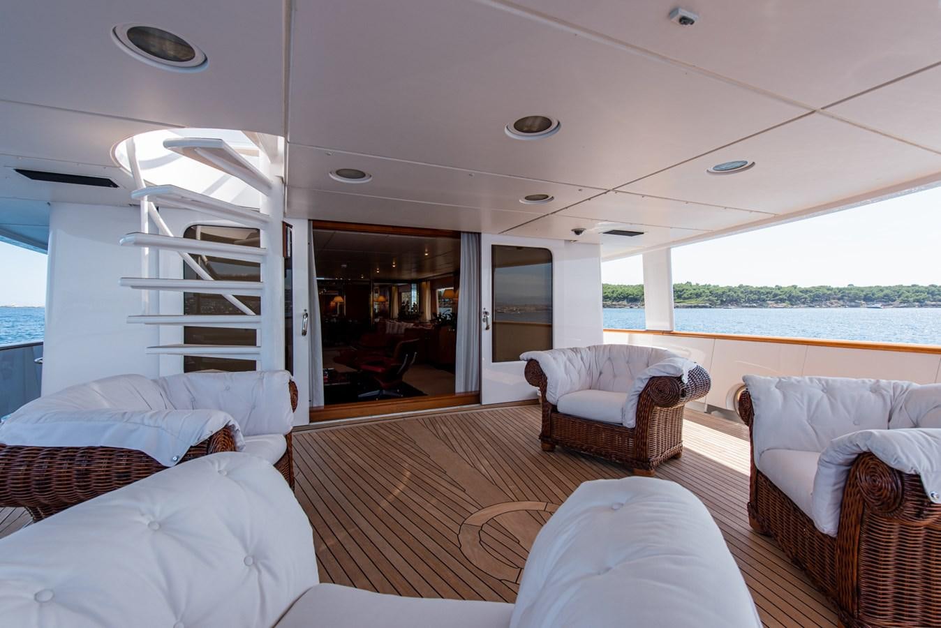 a large living room with a large window aboard SHEERGOLD Yacht for Sale