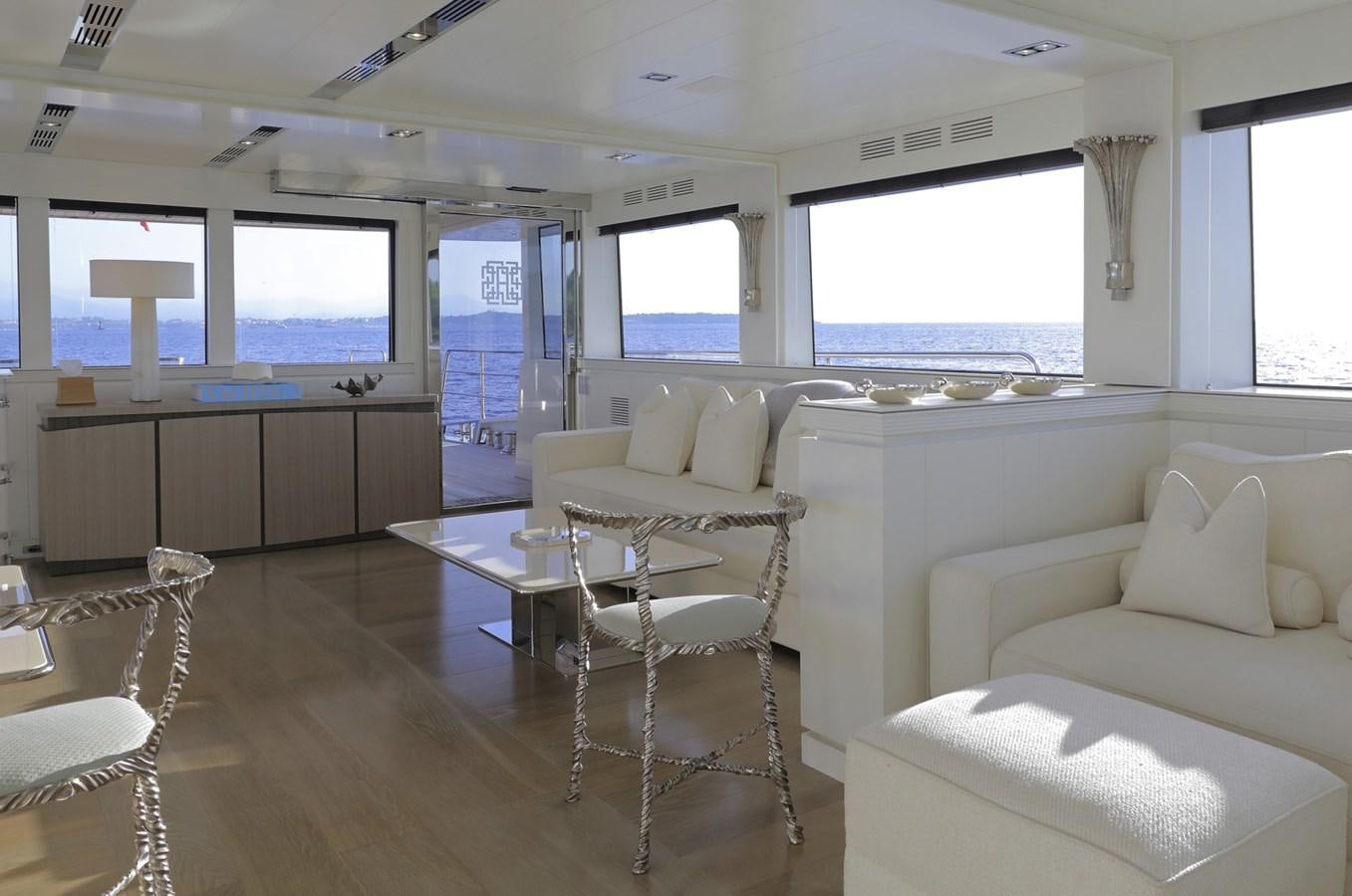 a living room with a large window aboard ALEXANDRA Yacht for Sale