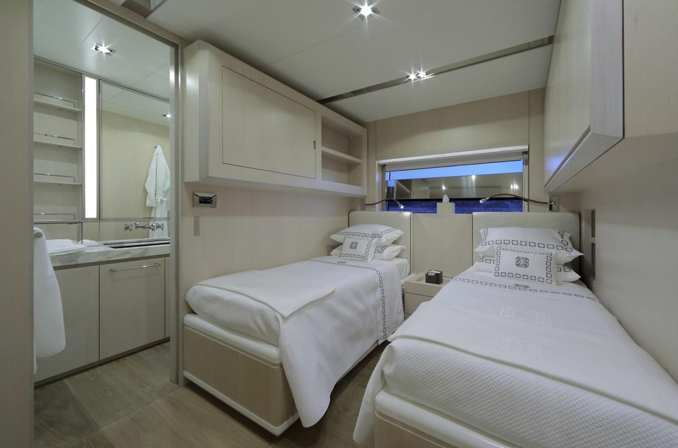 a couple of beds in a room aboard ALEXANDRA Yacht for Sale
