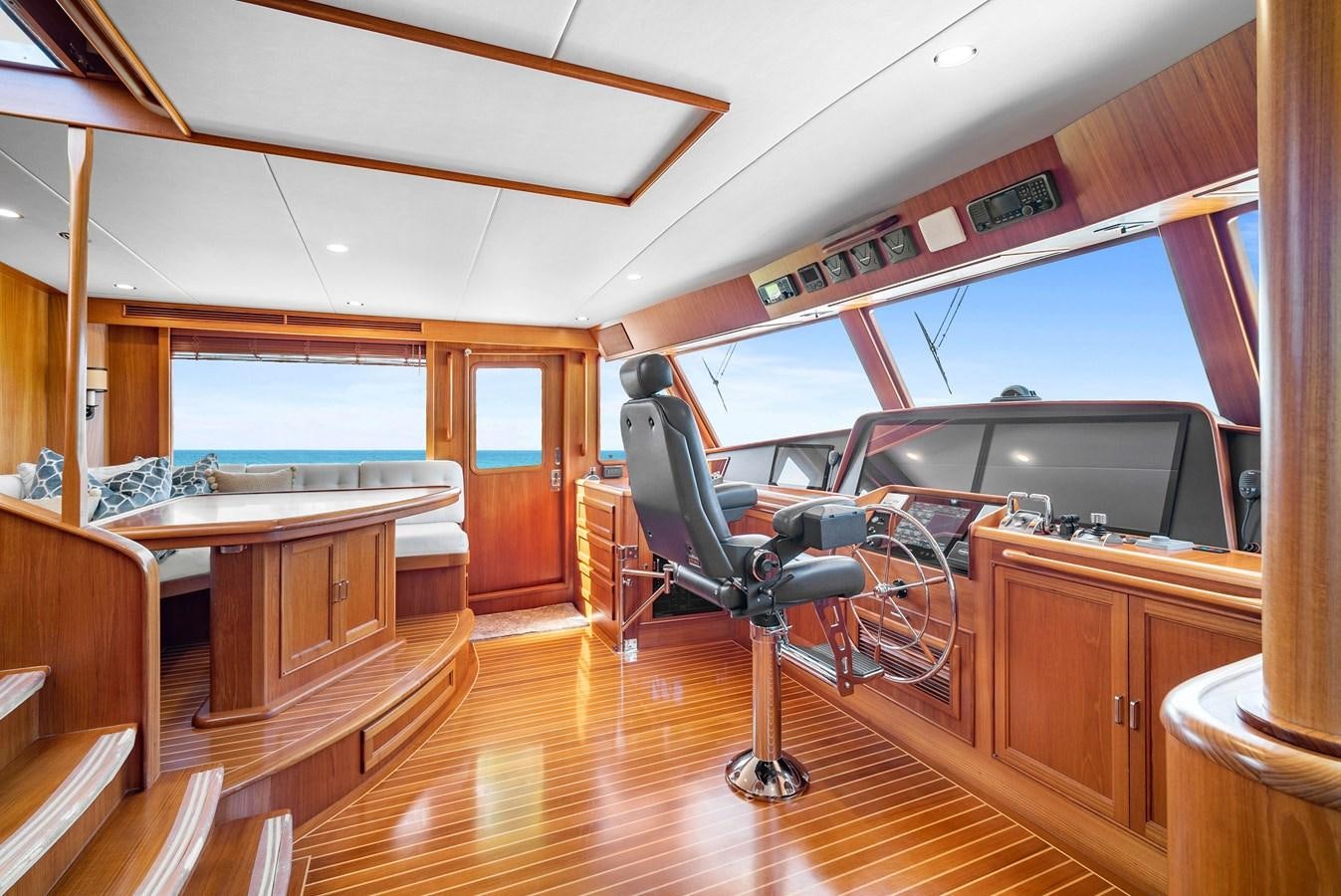 a bicycle on a wooden floor aboard FLEMING 78 - CLASSIC FLYBRIDGE Yacht for Sale