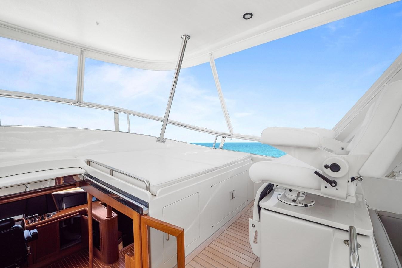 a boat with a deck aboard FLEMING 78 - CLASSIC FLYBRIDGE Yacht for Sale