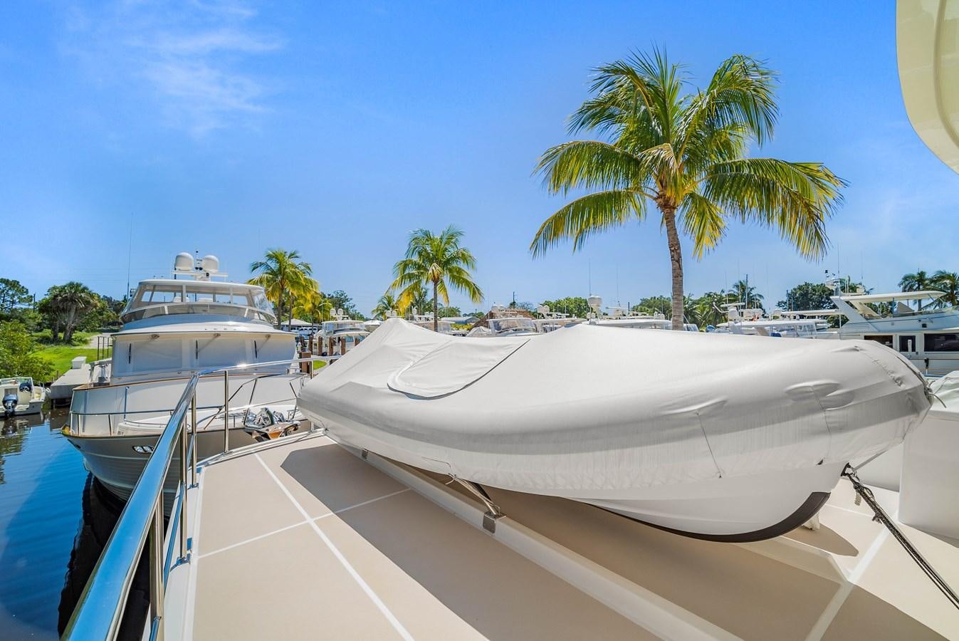 a group of boats on a body of water aboard FLEMING 78 - CLASSIC FLYBRIDGE Yacht for Sale