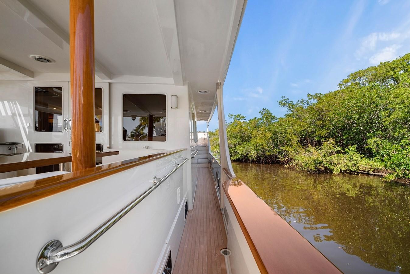 a boat on a river aboard FLEMING 78 - CLASSIC FLYBRIDGE Yacht for Sale