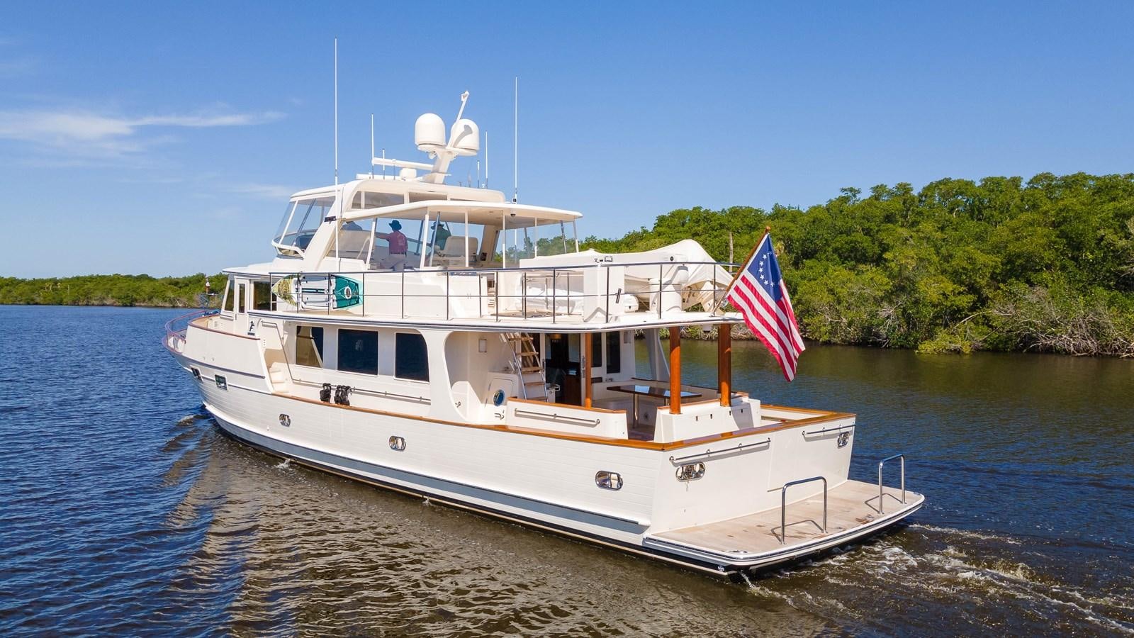a boat on the water aboard FLEMING 78 - CLASSIC FLYBRIDGE Yacht for Sale
