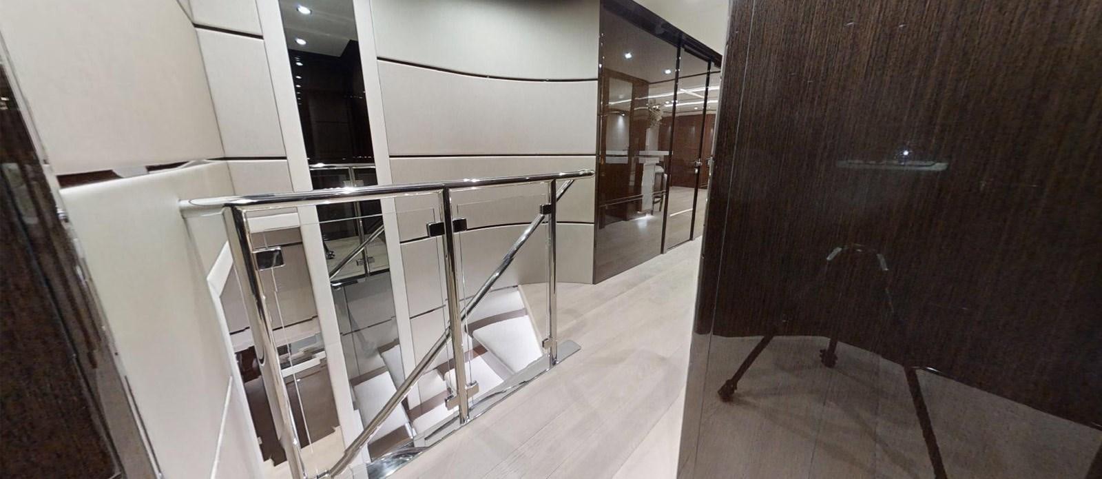 a staircase in a building aboard ROGUE Yacht for Sale