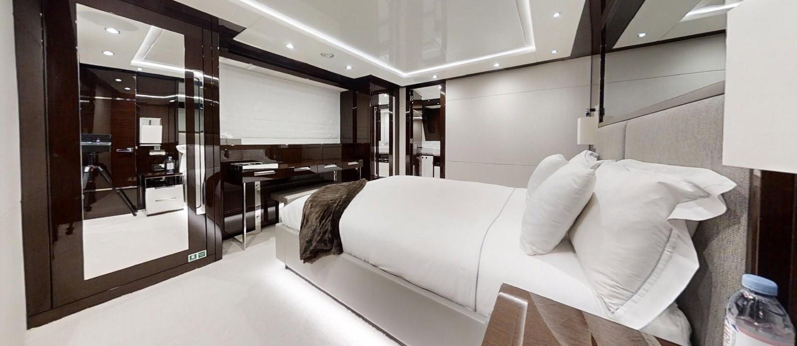 a room with a couch and a table aboard ROGUE Yacht for Sale