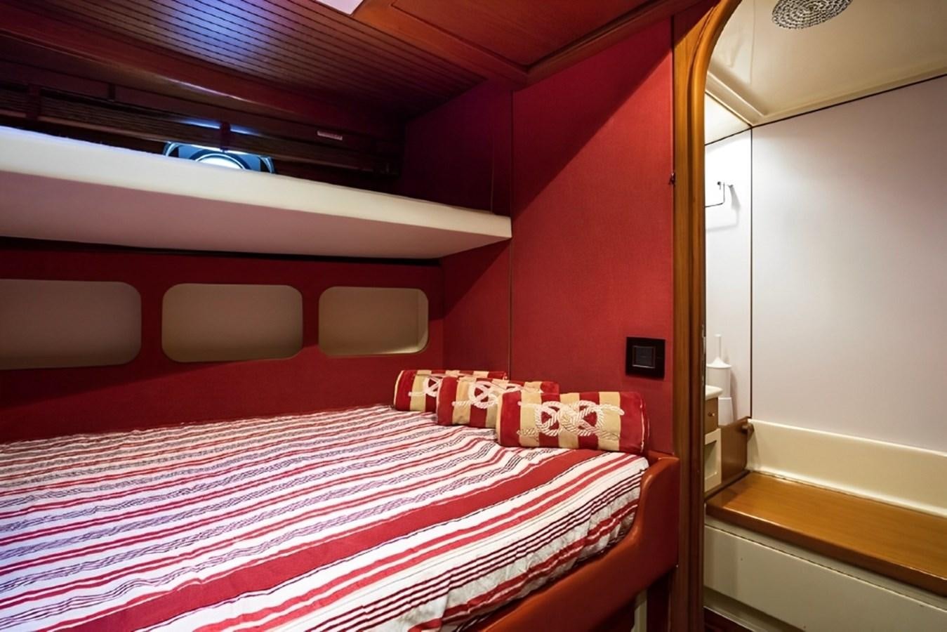 a bed in a room aboard ELETTRA Yacht for Sale