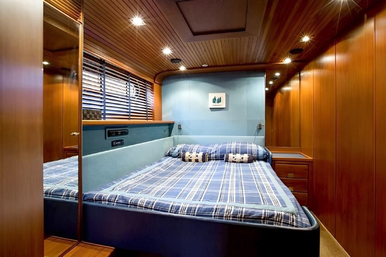 a bed in a room aboard ELETTRA Yacht for Sale