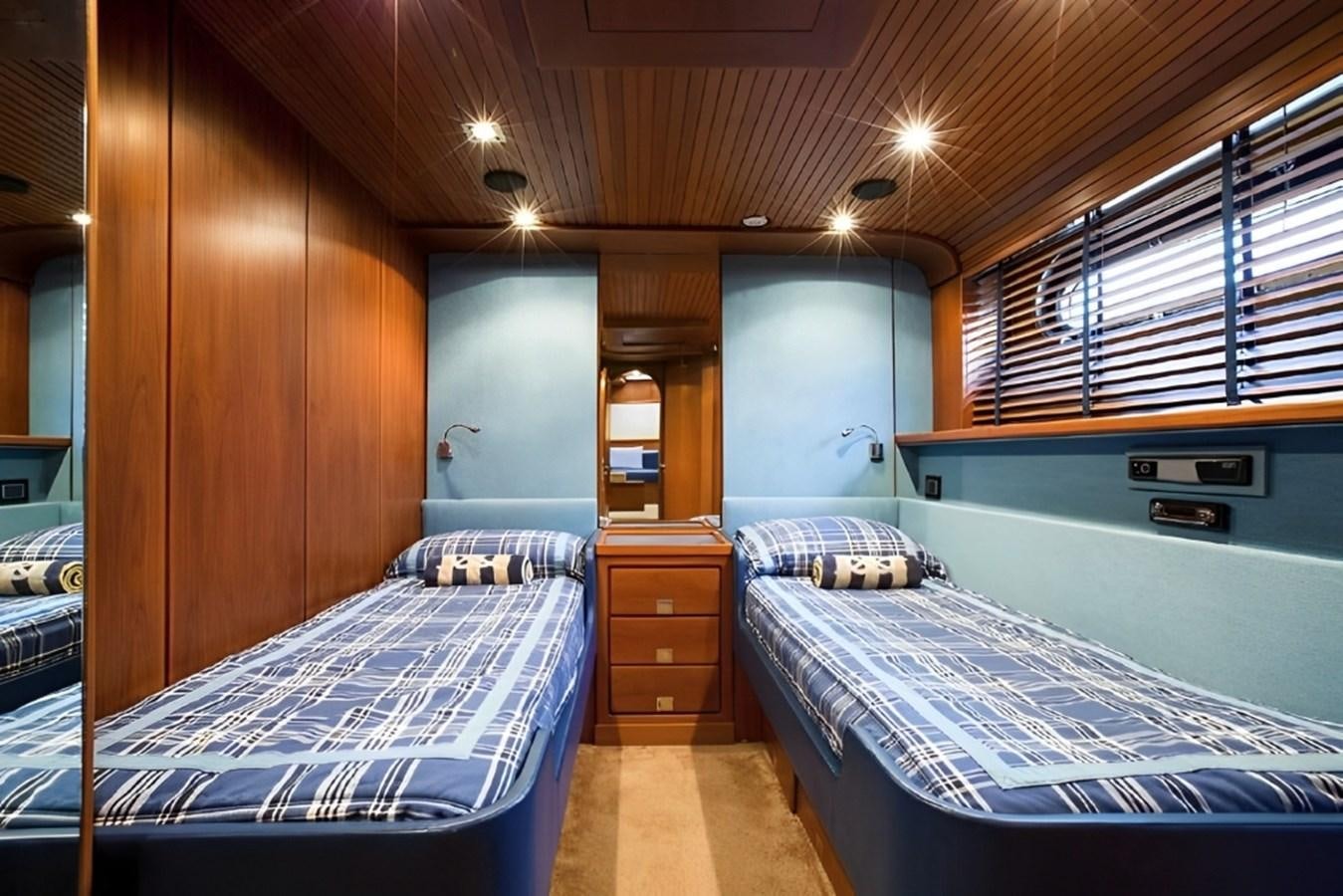 a room with bunk beds aboard ELETTRA Yacht for Sale