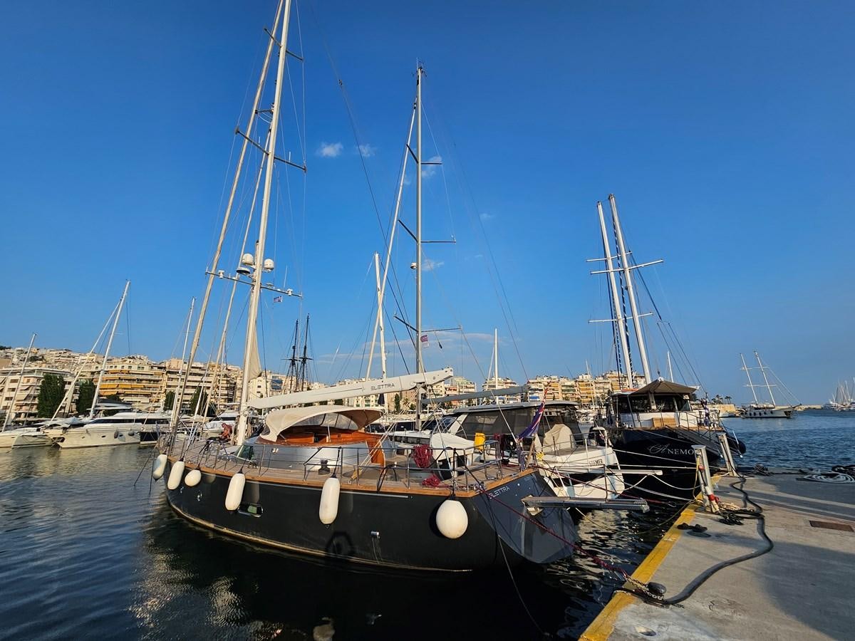a boat docked at a pier aboard ELETTRA Yacht for Sale