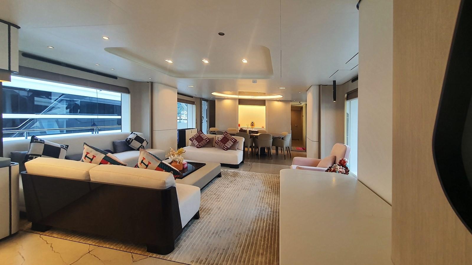 a living room with a large window aboard M32 025 Yacht for Sale